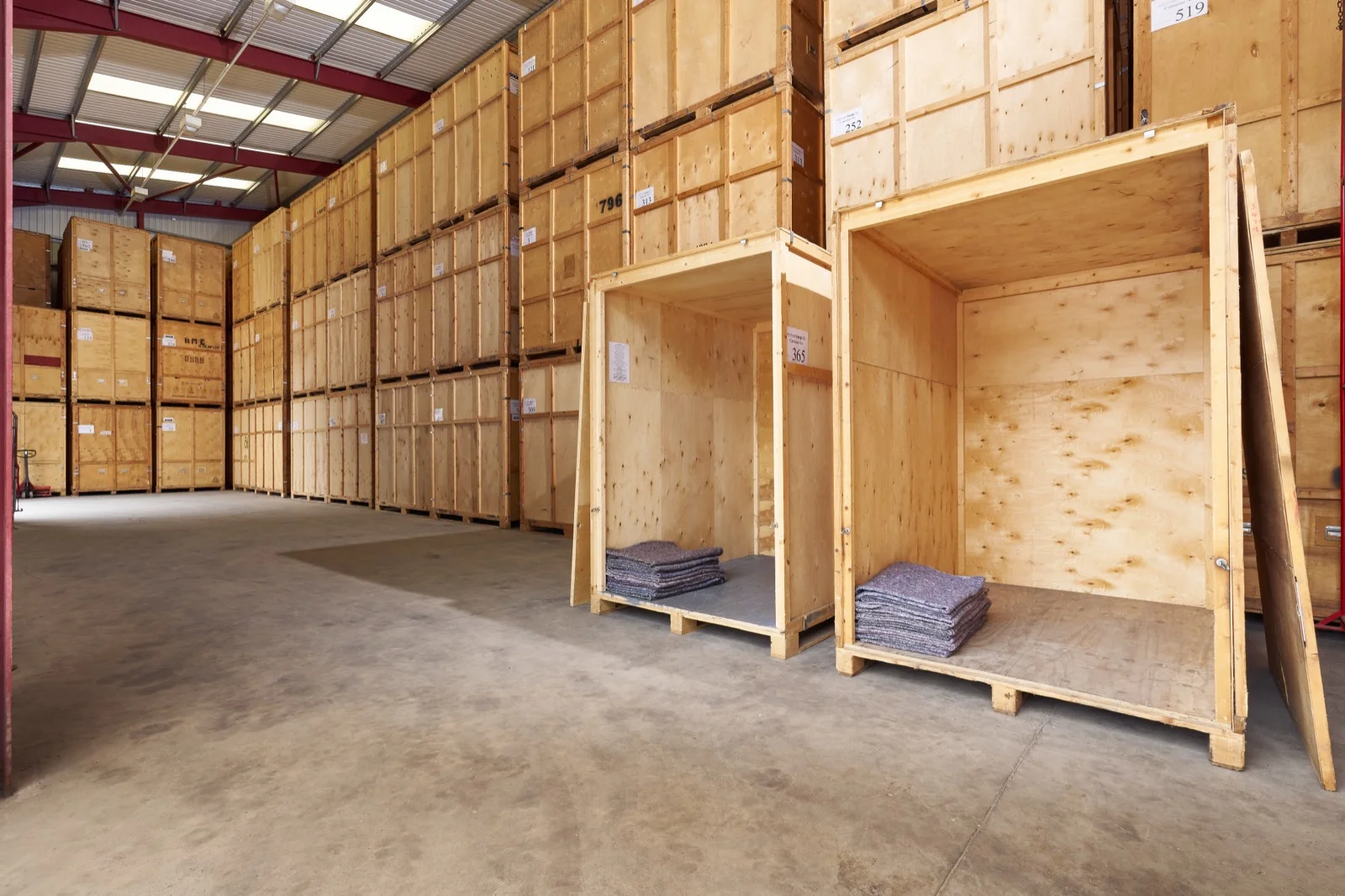 Open wooden storage vaults ready to be packed at the Collect Storage facility
